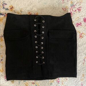 Black mini pencil skirt with tie front and cargo style for night out